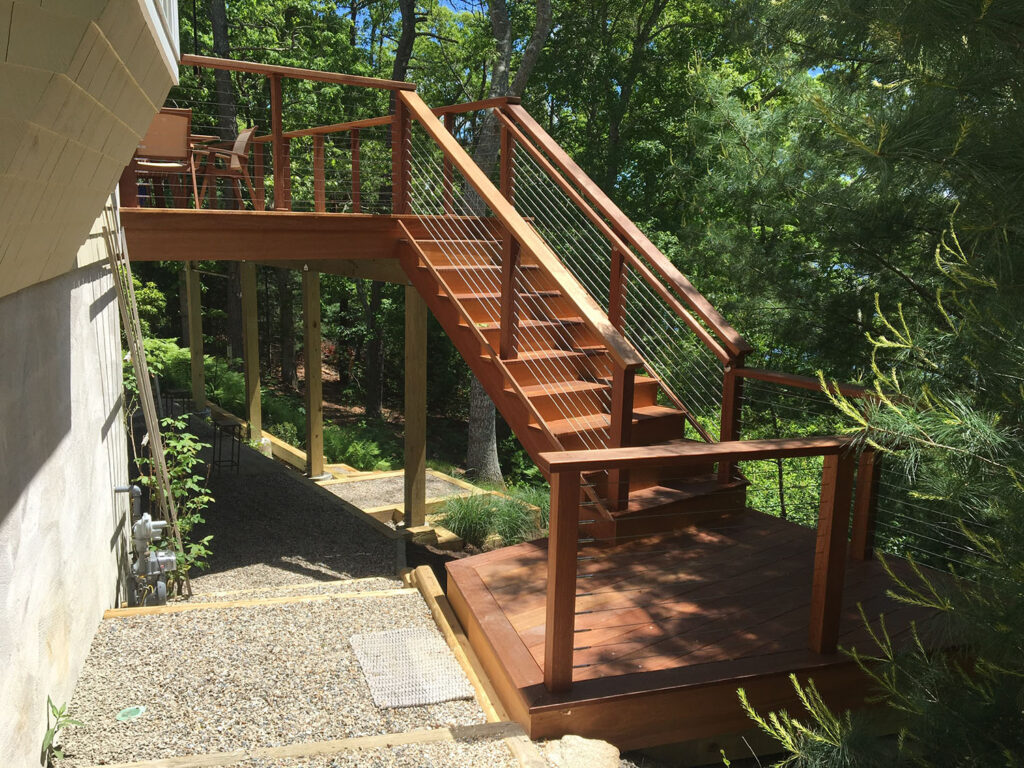 Hardwood Decking | Mahogany Hardwood Deck with mahogany stairs leading up to the deck | Backyard Creations | Custom Decks, Porches, and Pergolas