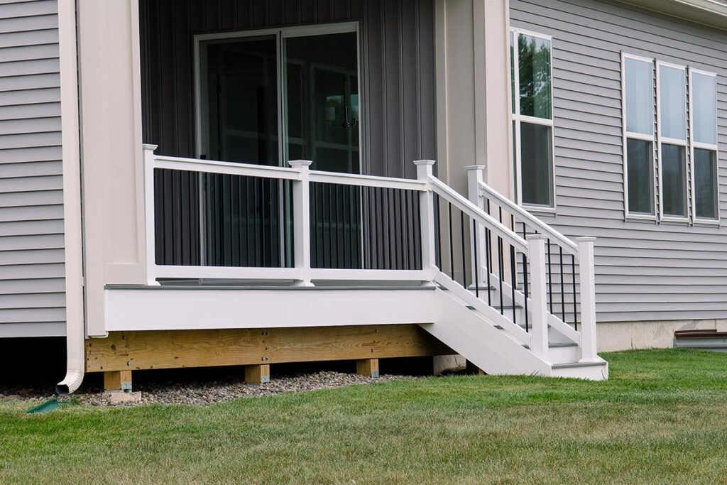 Decking Material | Deck on home | Backyard Creations | Custom Decks, Porches, and Pergolas